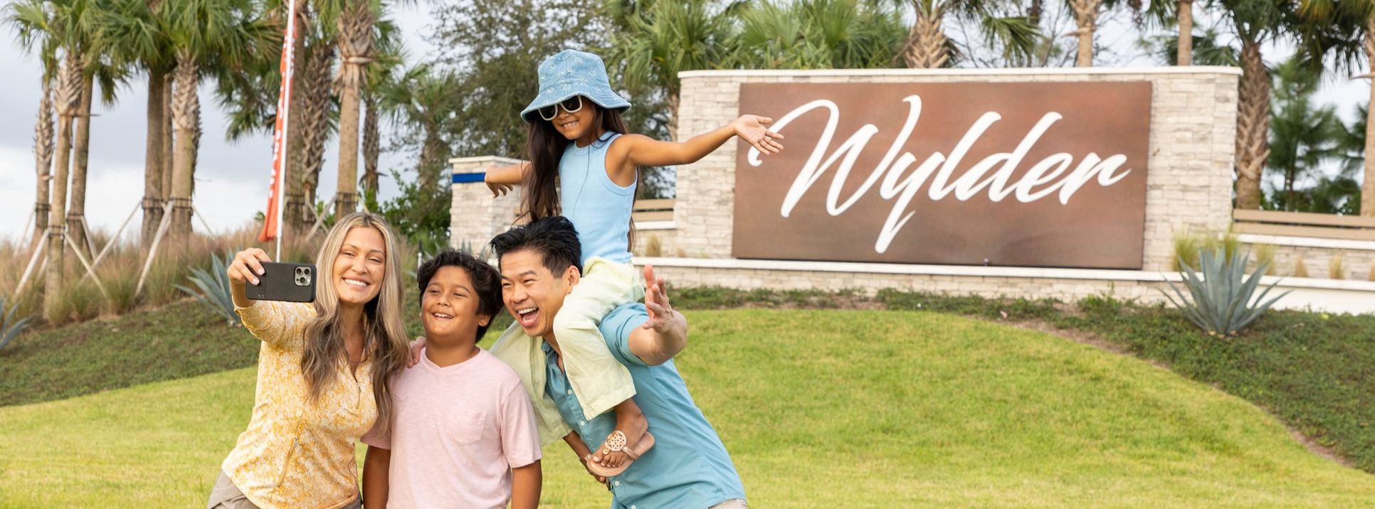 Brystol at Wylder family in front of monument