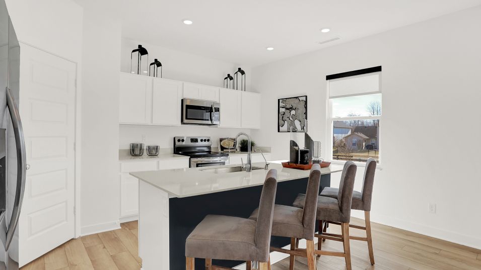 This chef-ready kitchen showcases an inviting cent