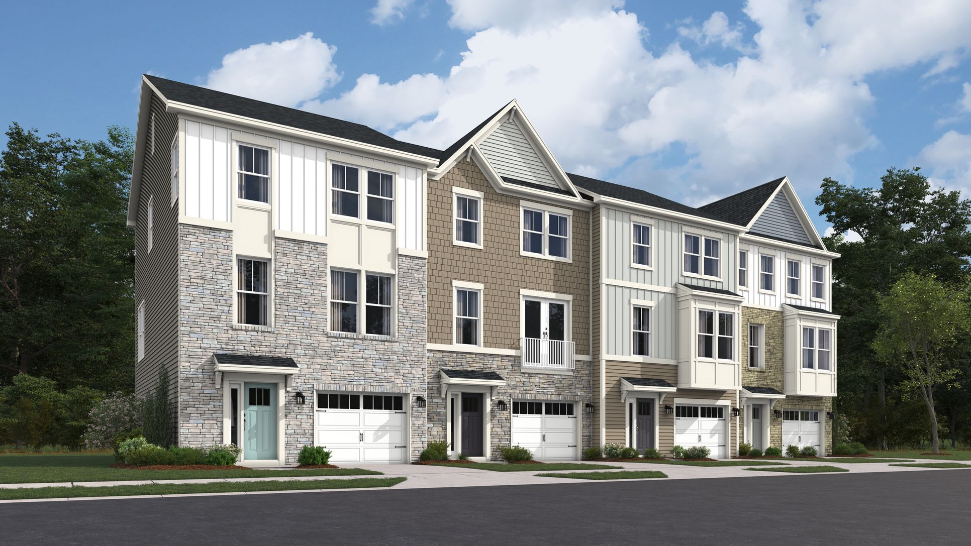 Exterior:Front elevation of a 3 level townhomes with stone, and siding