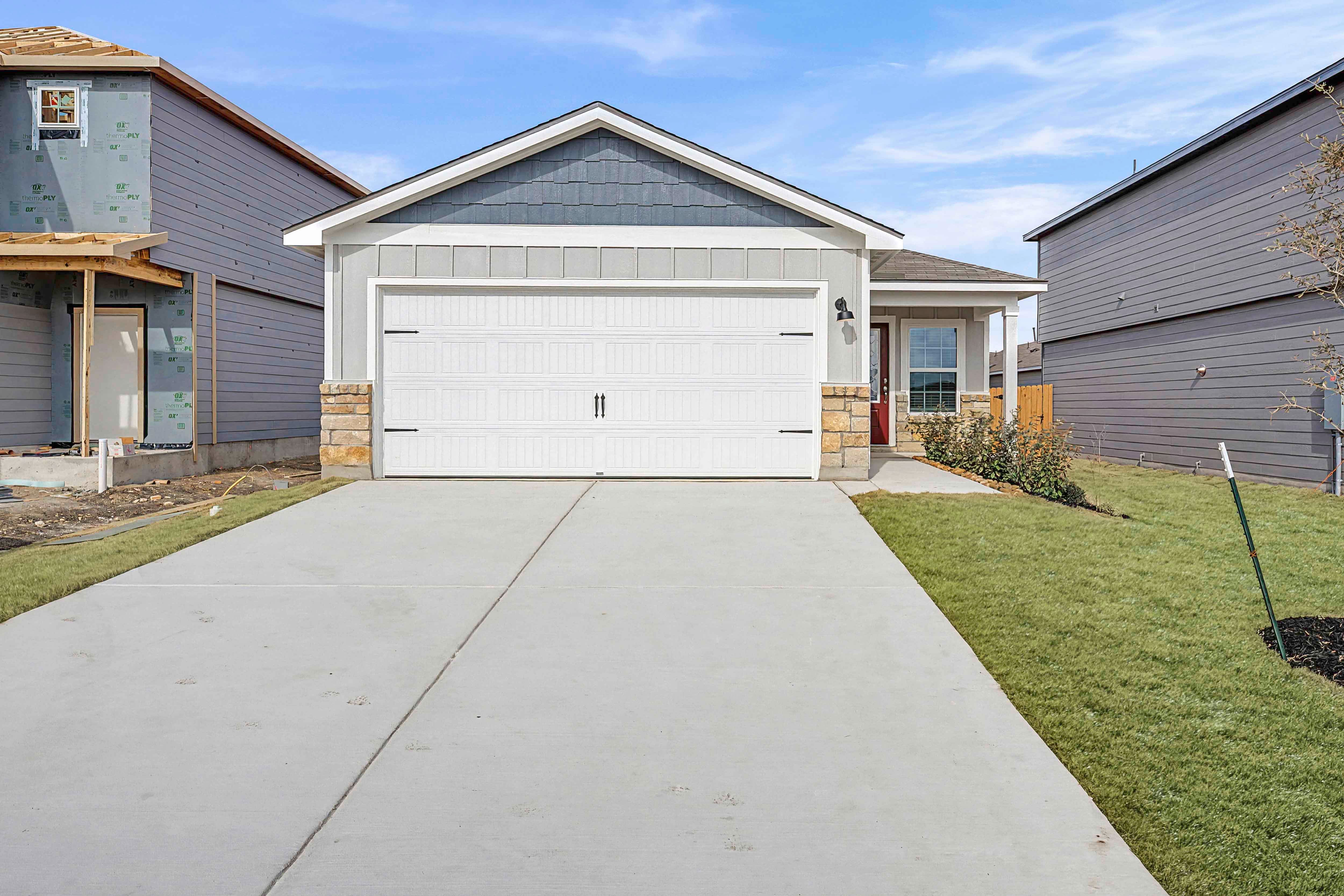Exterior of the Hawthorne with a two-car garage.