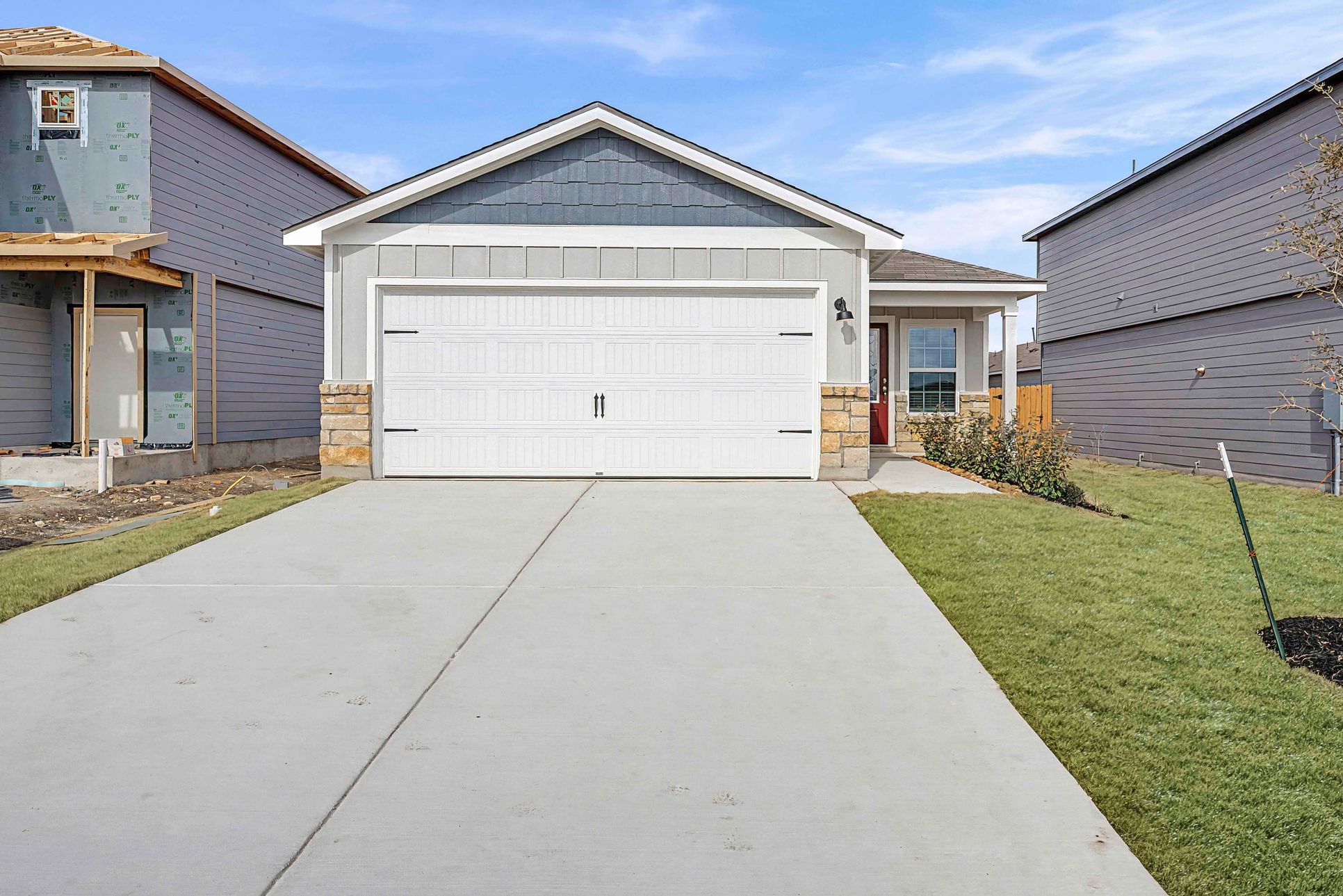 Exterior of the Hawthorne with a two-car garage.