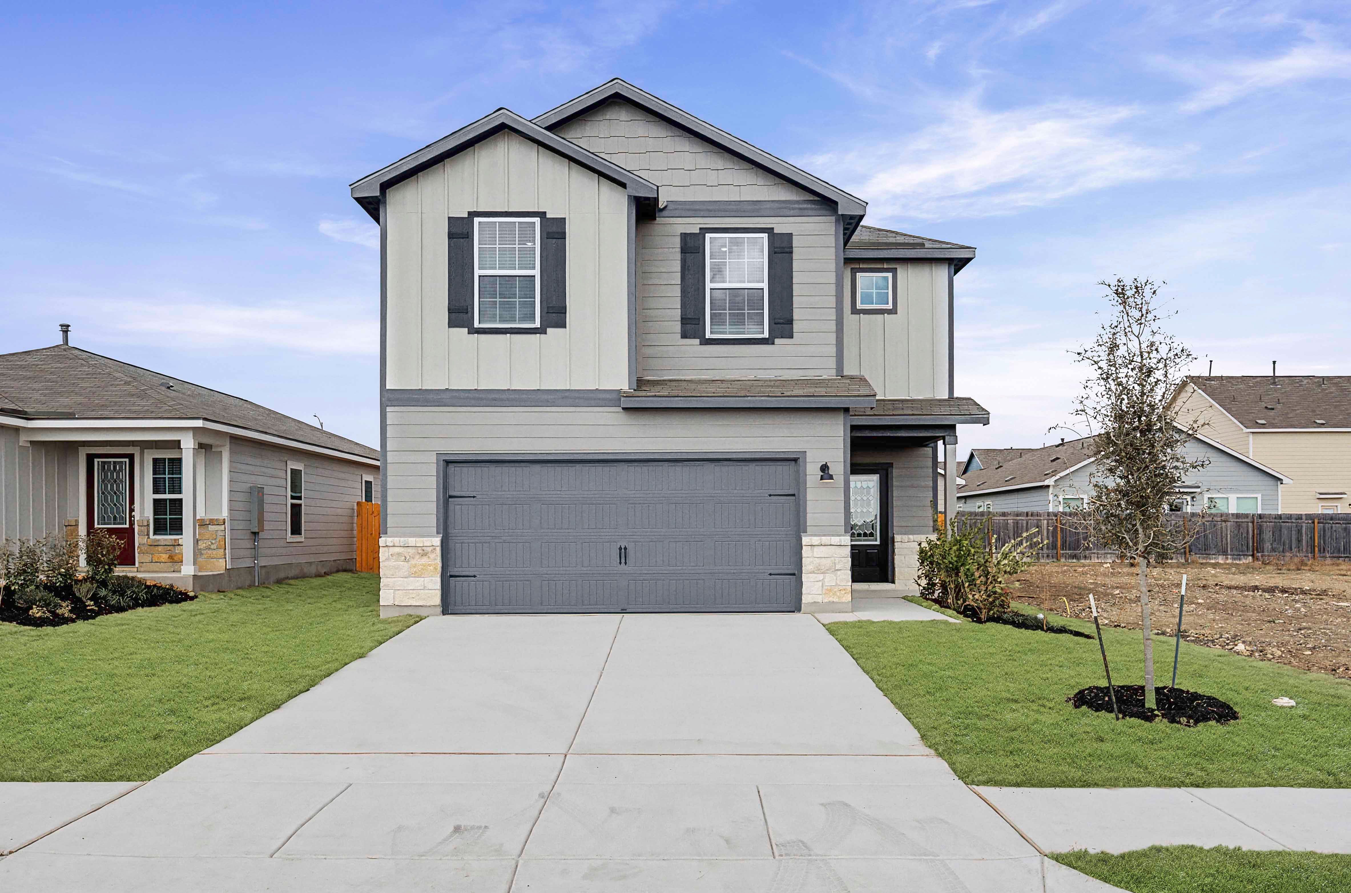 Exterior of the Mesquite plan with professional front yard landscaping