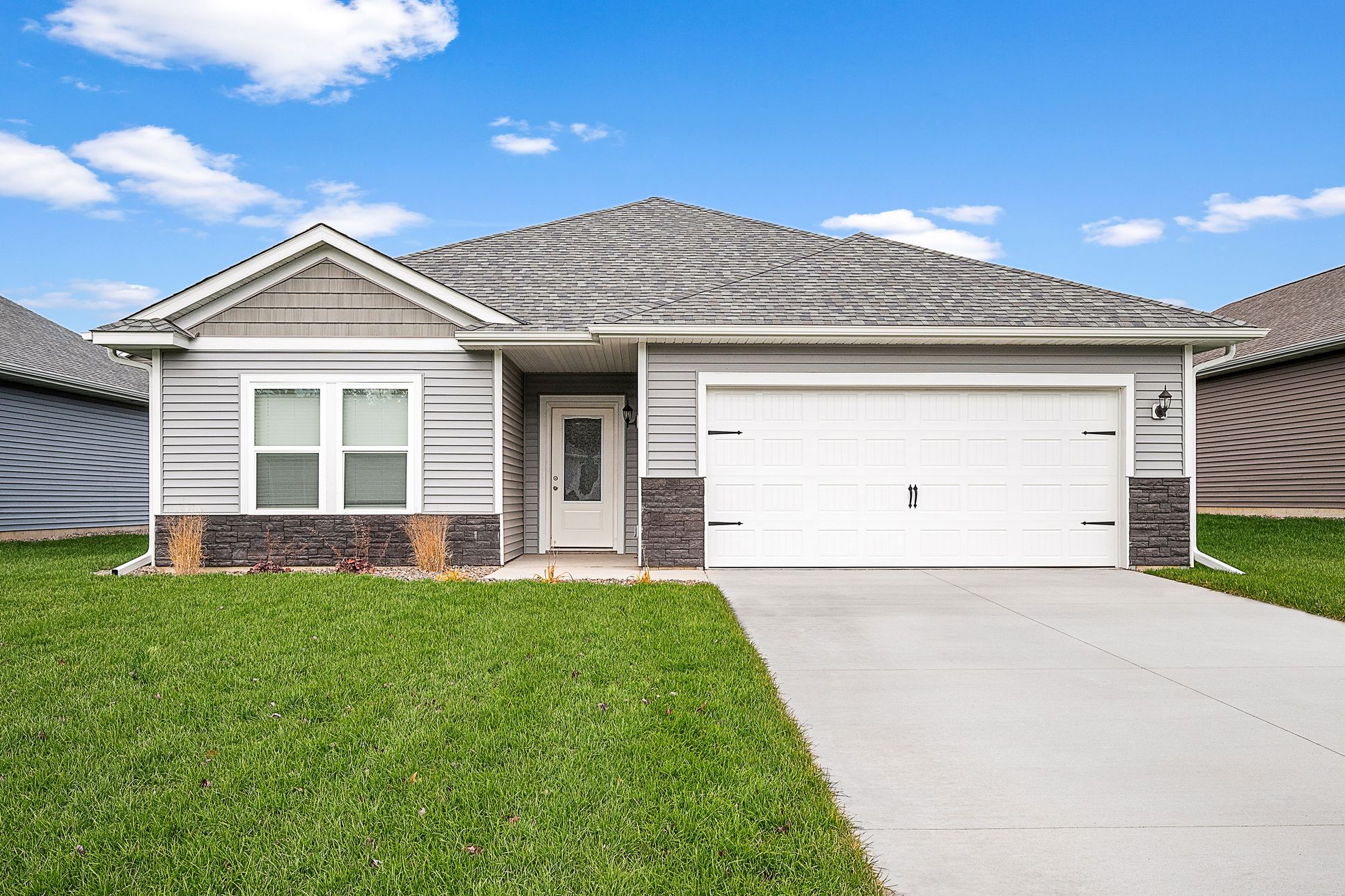 The Goodhue by LGI Homes:Beautiful home with stone and plank siding