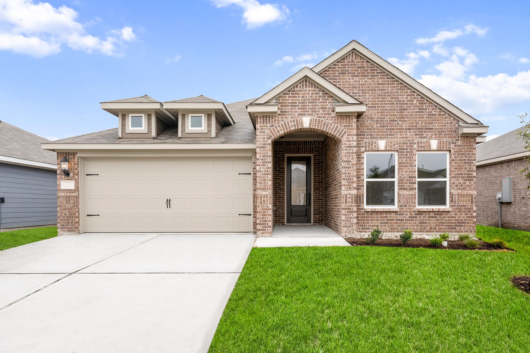 The Erie by LGI Homes:The Erie floor plan has a beautiful brick exterior.