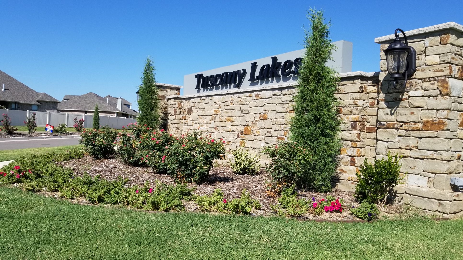 LGI Homes at Tuscany Lakes :Tuscany Lakes monument at neighborhood entrance.