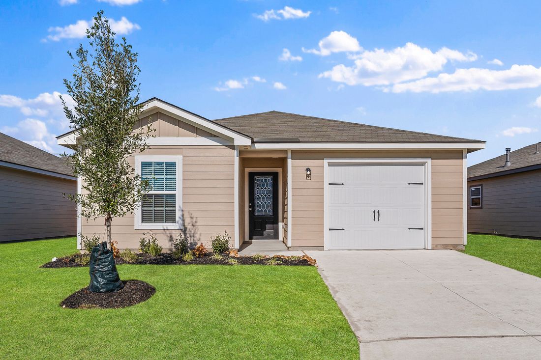 The Ash floor plan by LGI Homes with front yard landscaping