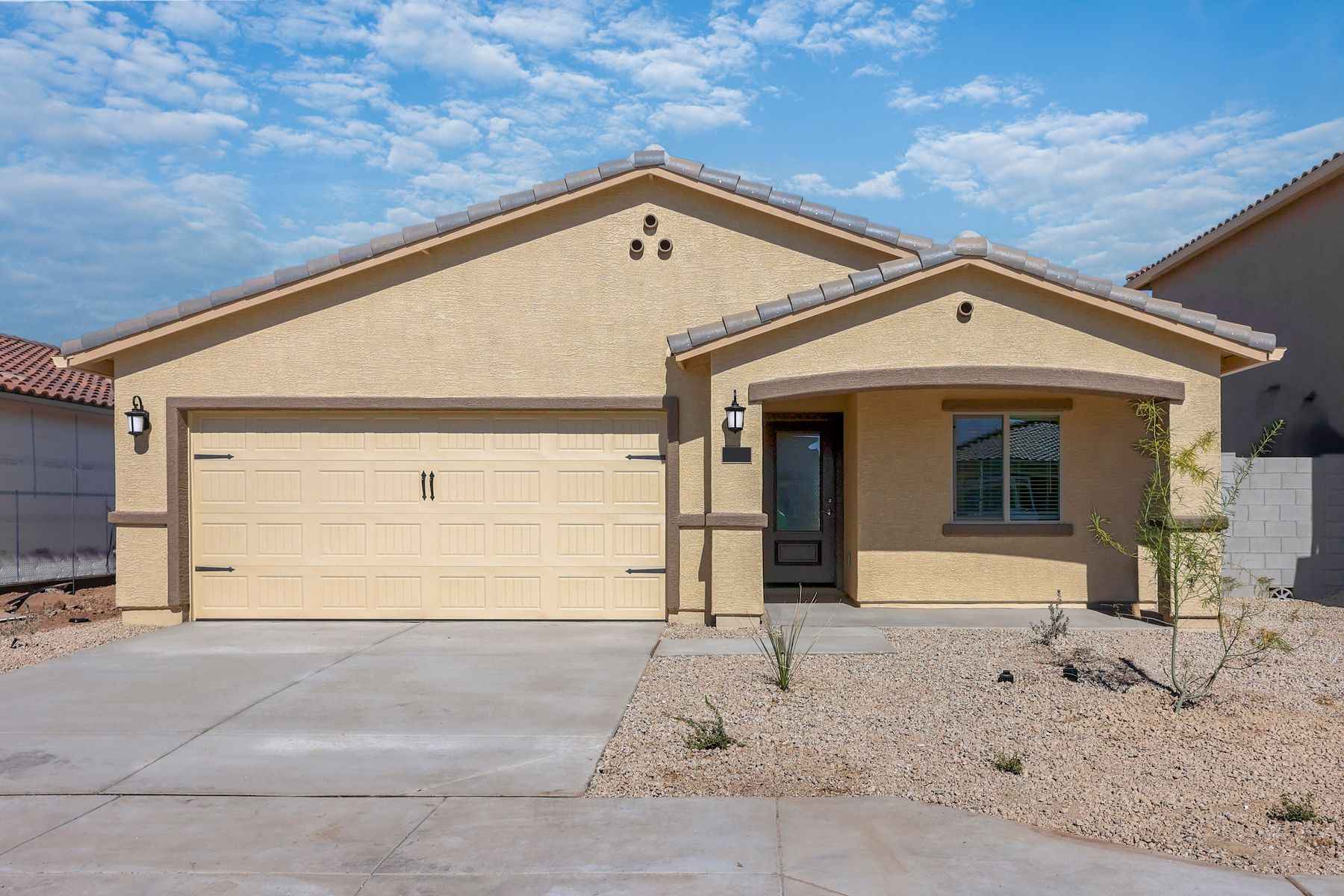This home has a 2-car garage and gorgeous stucco exterior.