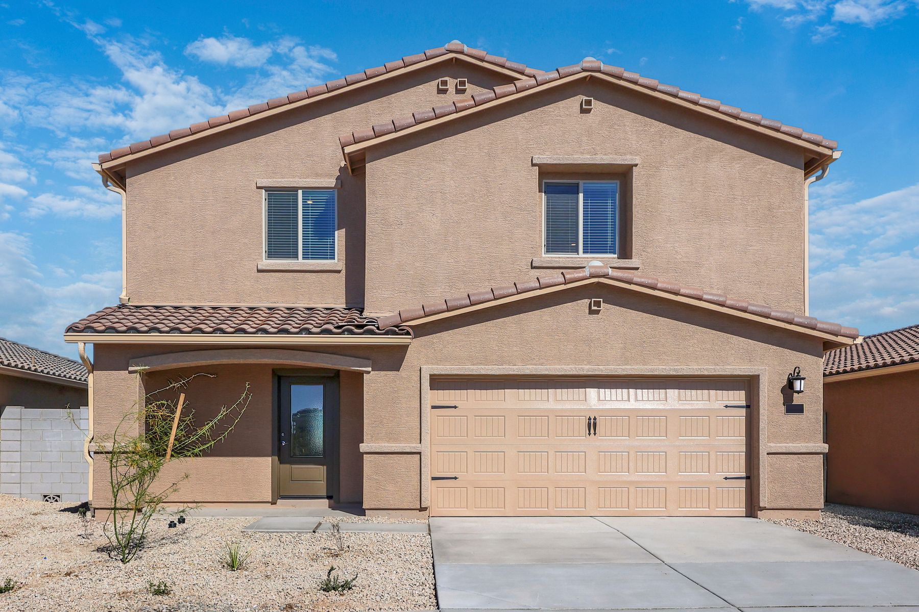 Exterior:This home has a 2-car garage and a beautiful stucco exterior.
