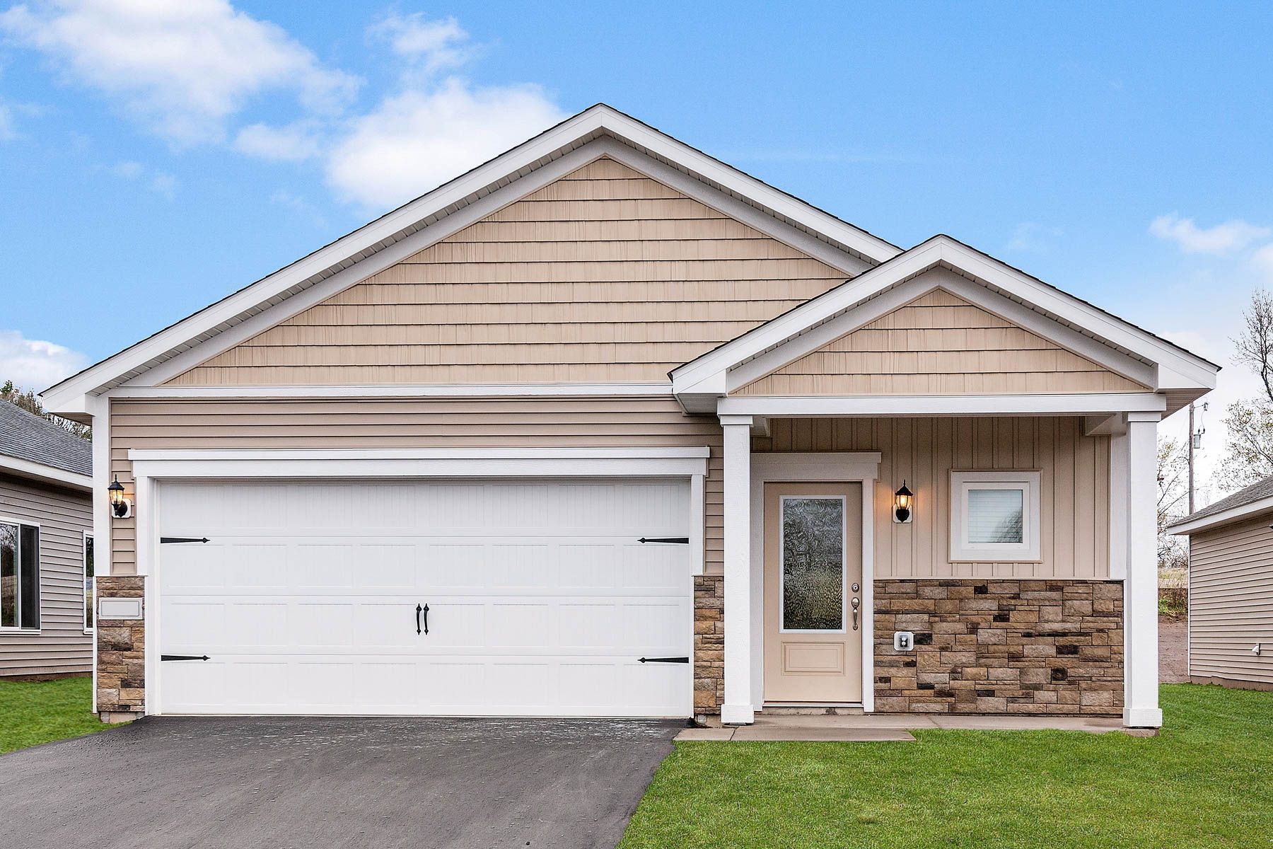 The Aspen by LGI Homes:The Aspen is a beautiful single story home with siding and stone.
