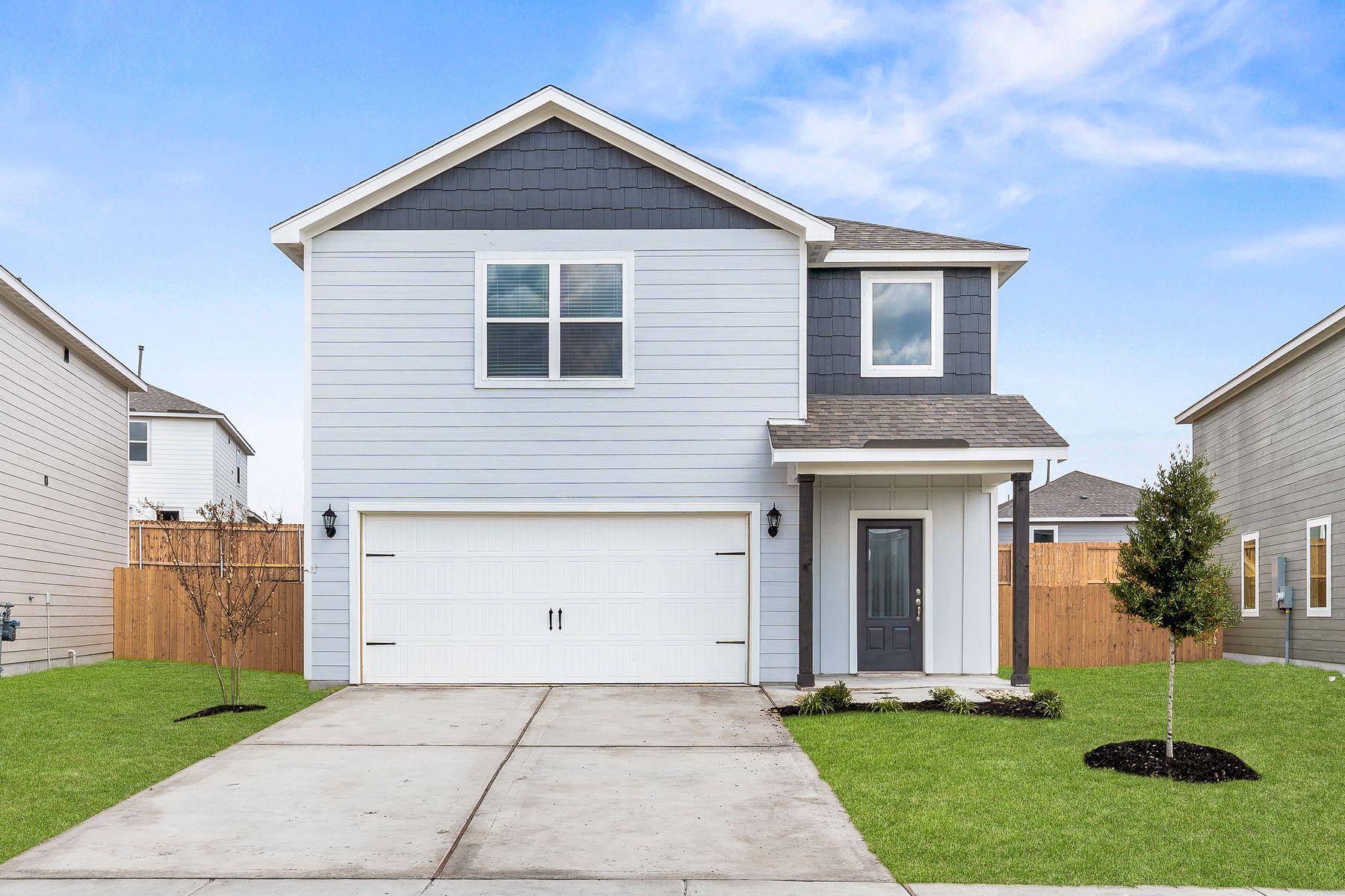 The Rayburn by LGI Homes:The Rayburn is a beautiful two-story siding home.