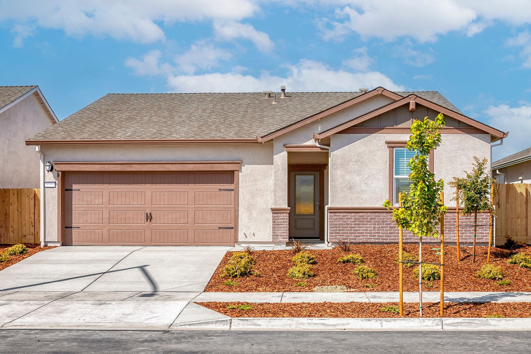 The Eureka by LGI Homes:The Eureka is a single story home with stucco and brick.