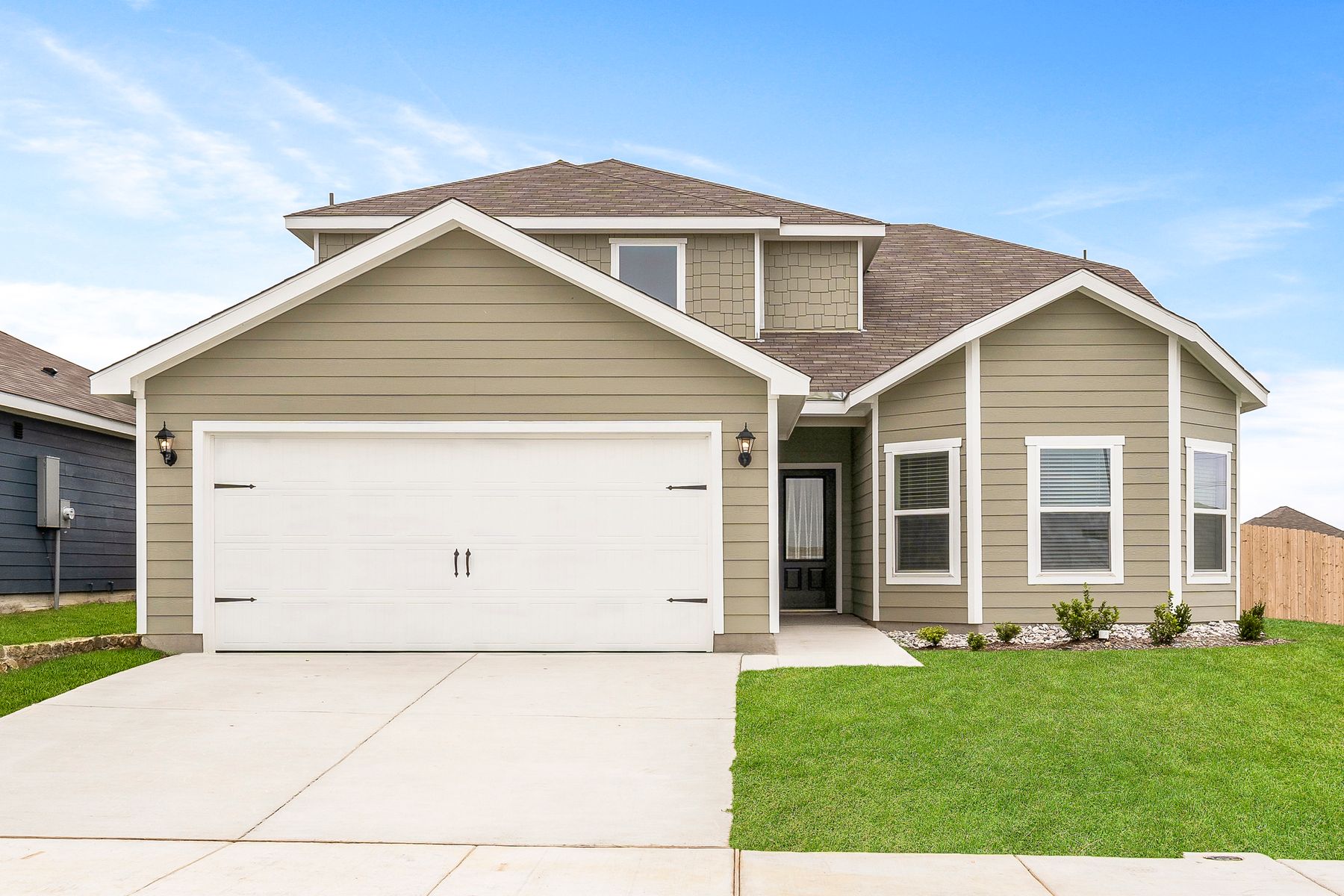 The Cypress by LGI Homes:Exterior photo of the beautiful two-story Cypress.