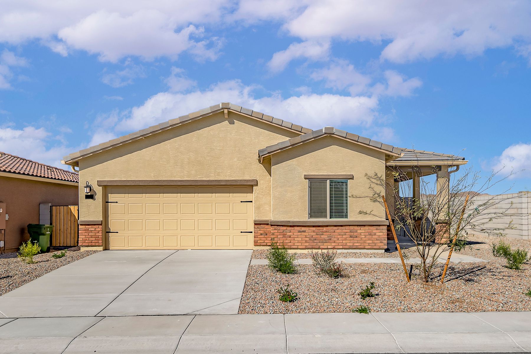 This home has a beautiful stucco exterior and two-car garage.