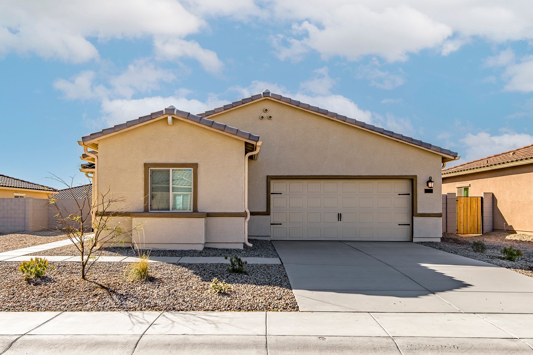 This home has a beautiful stucco exterior and two-car garage.