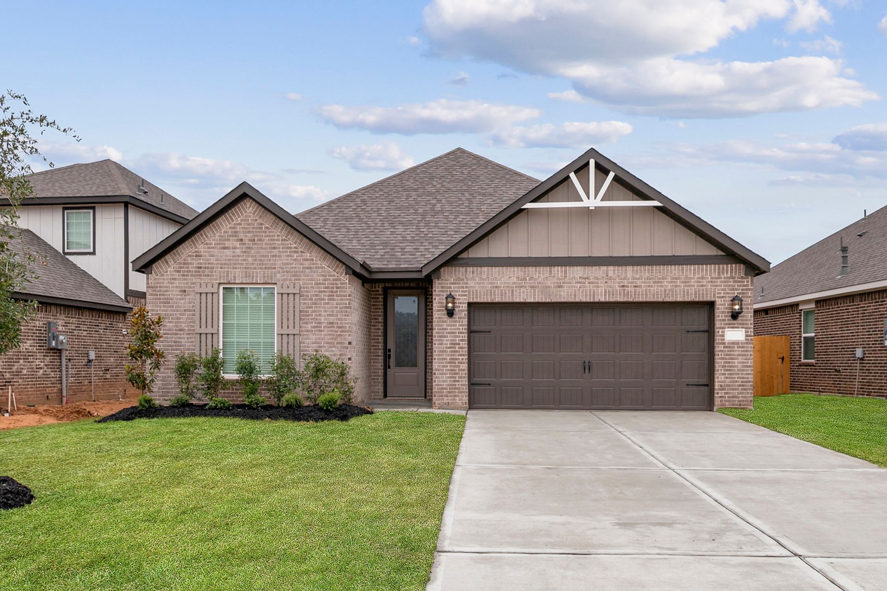 The Falls plan is a spacious single-story brick home