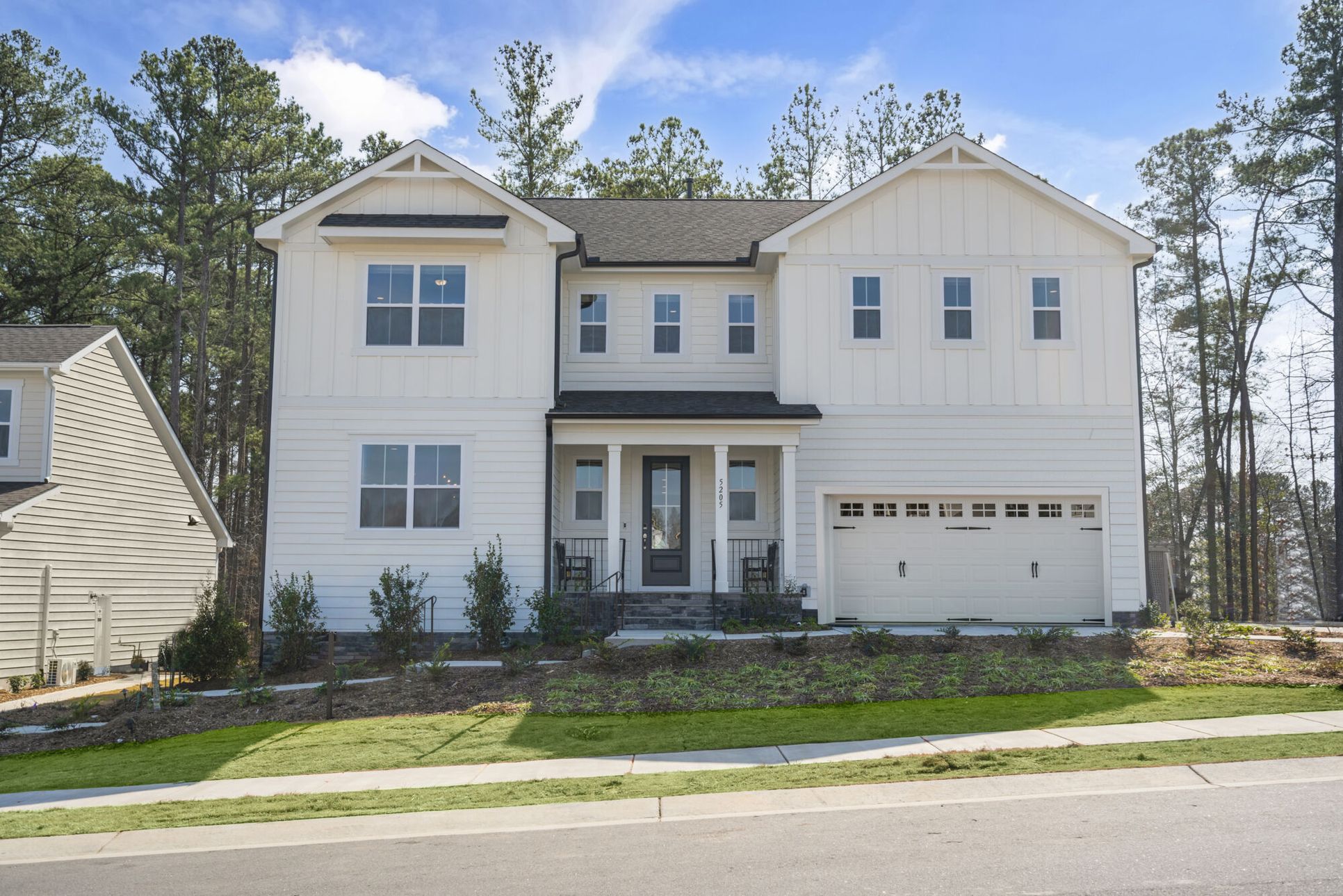Exterior:Prescott Farmhouse elevation in High Grove Oaks