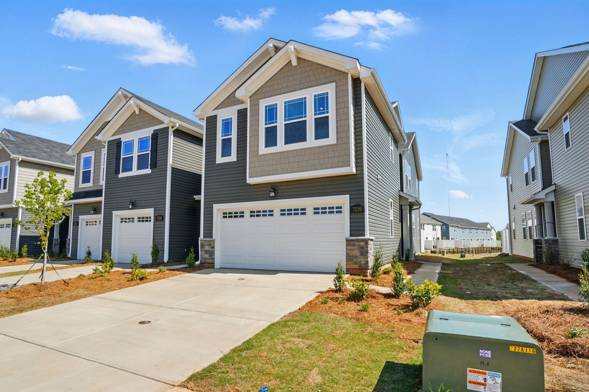 Exterior:Front exterior and 1-car garage