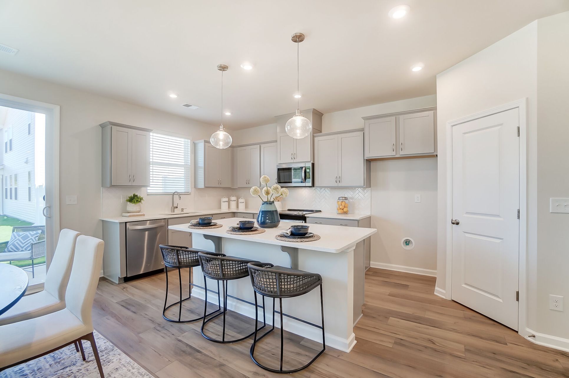 Kitchen with island breakfast bar