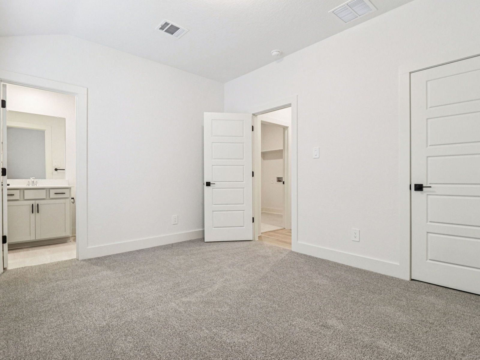 Guest bedroom in the Henderson floorplan at a Meritage Homes community.:Guest Bedroom