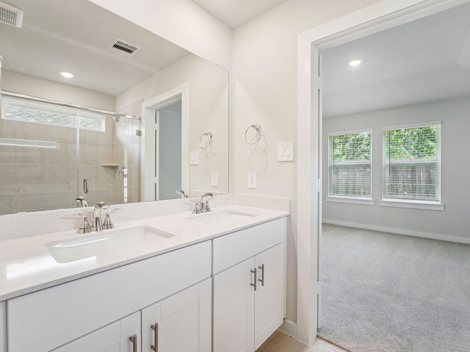 Primary Bathroom:The Carlsbad floorplan in Mavera of Conroe, TX.