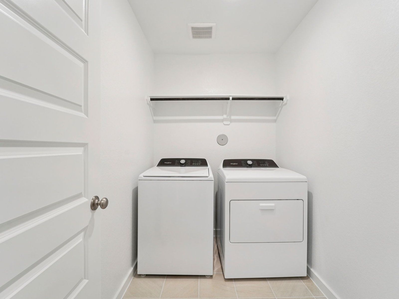 The Carlsbad floorplan in Mavera of Conroe, TX.:Laundry Room