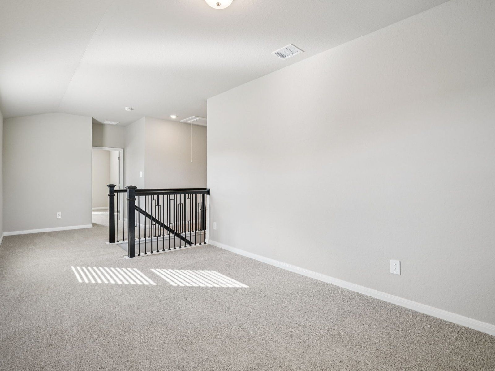 Loft in the McCoy floorplan at a Meritage Homes community.:Loft