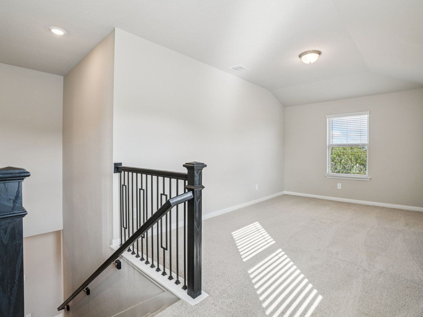 Loft:Loft in the McCoy floorplan at a Meritage Homes community.