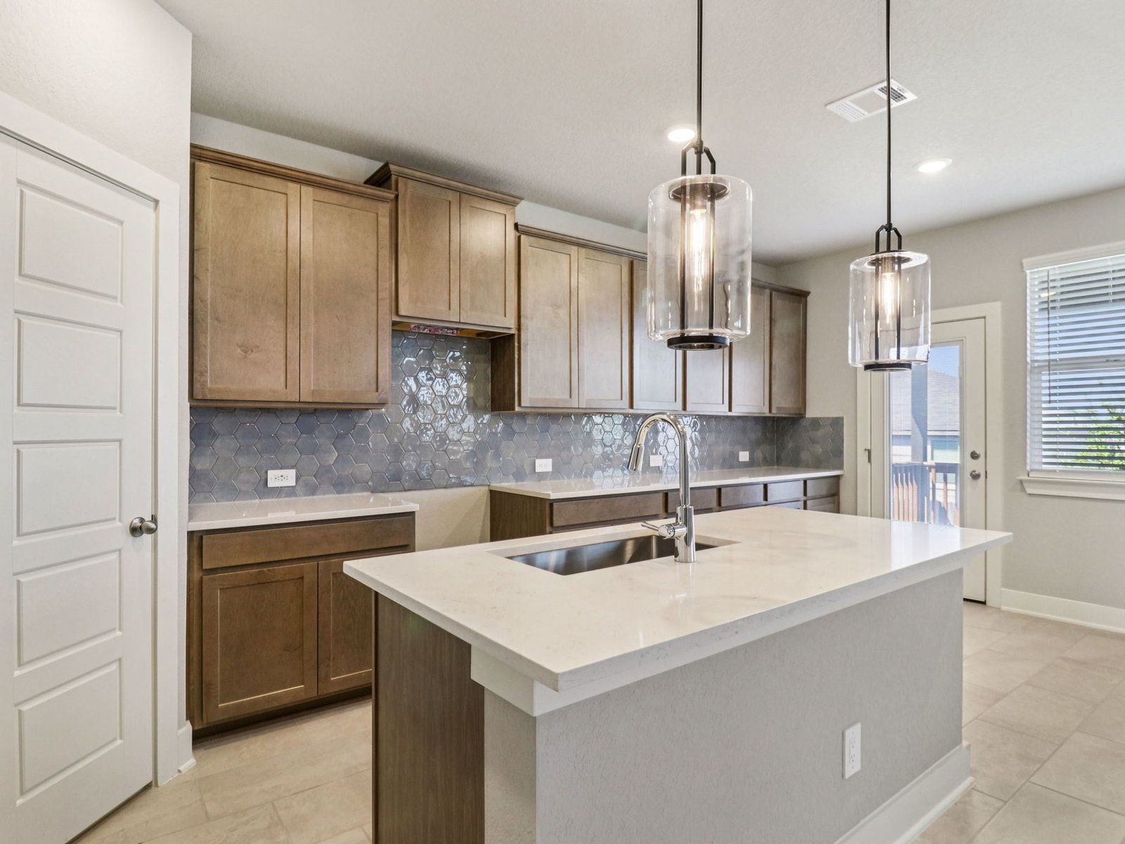 Kitchen:Kitchen in the Red River floorplan at a Meritage Homes community.