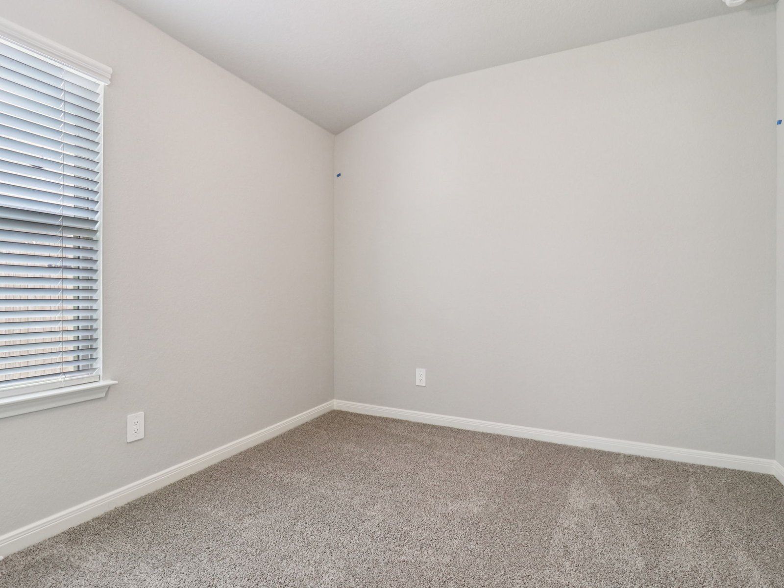 Guest bedroom in the Callaghan floorplan at a Meritage Homes community.:Guest Bedroom