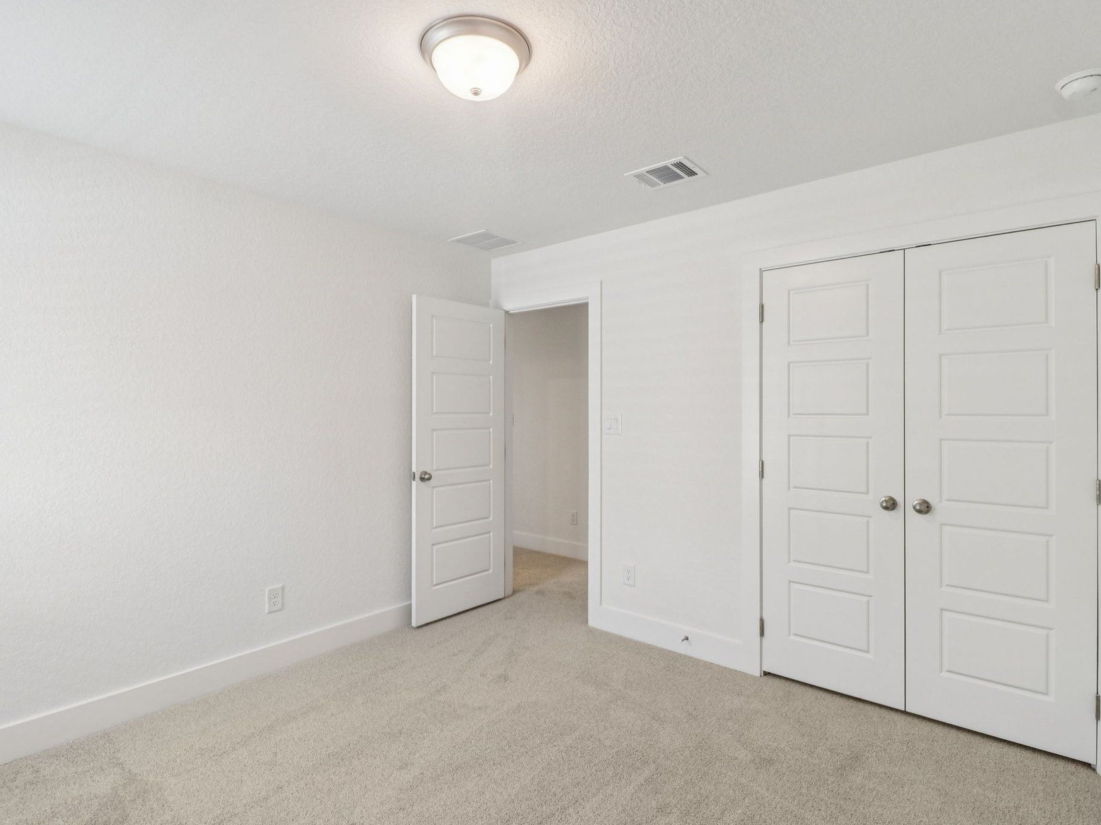 Guest bedroom in the Matador floorplan at a Meritage Homes community.:Guest Bedroom