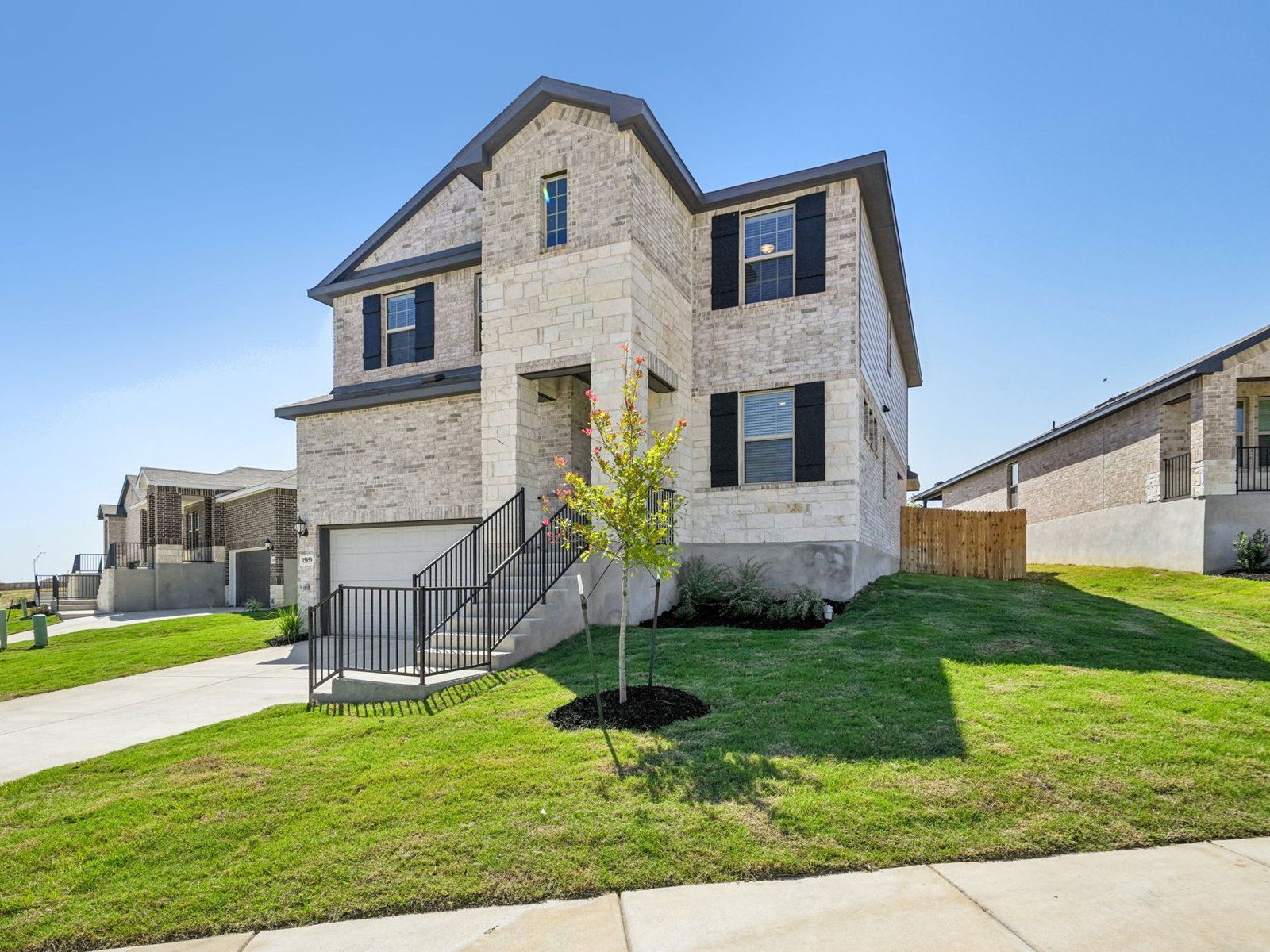Front exterior of the Red River floorplan at a Meritage Homes community.:Front Exterior