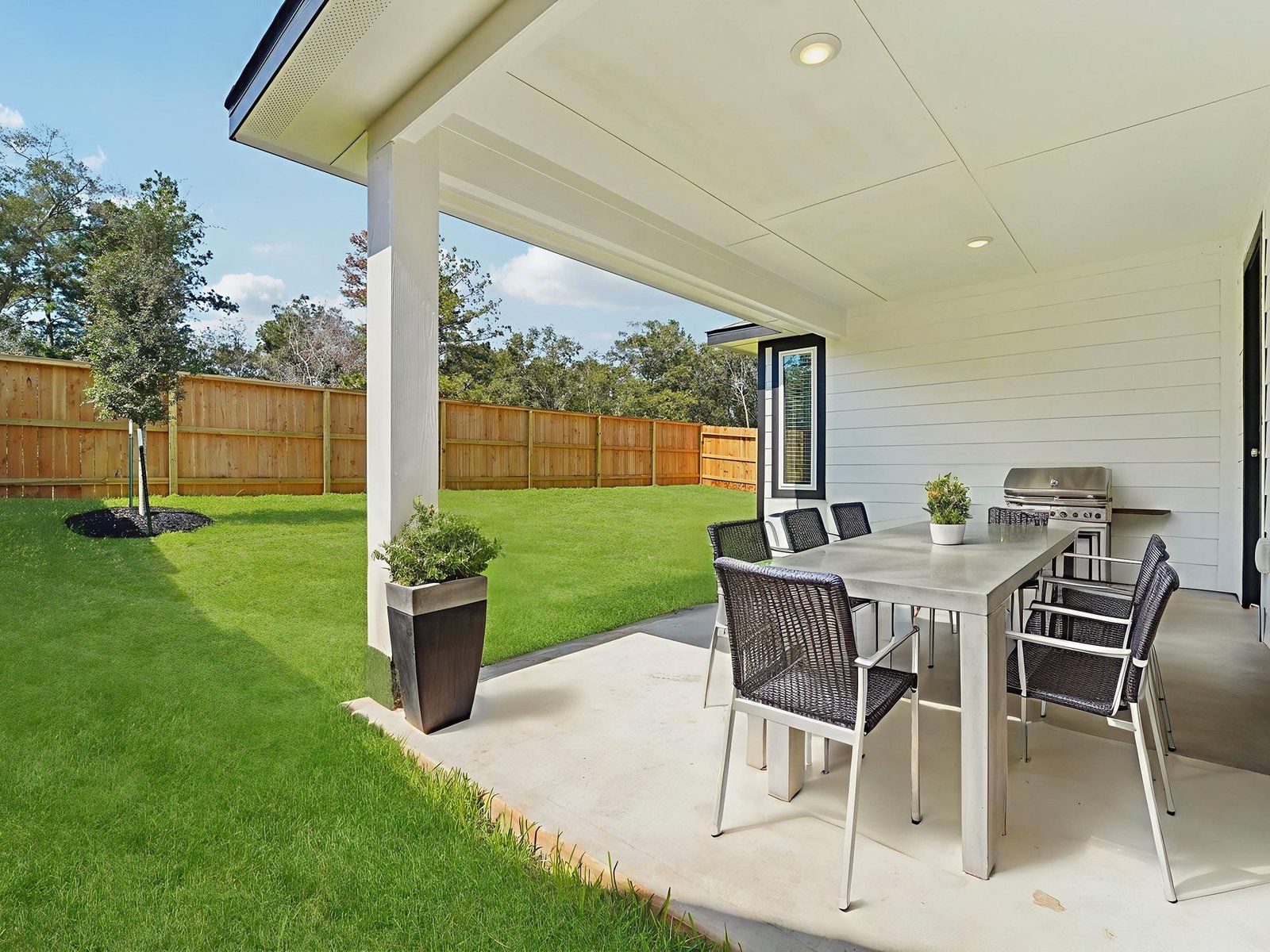 The Oleander floorplan in Stewart's Ranch of Conroe, TX.:Back Patio