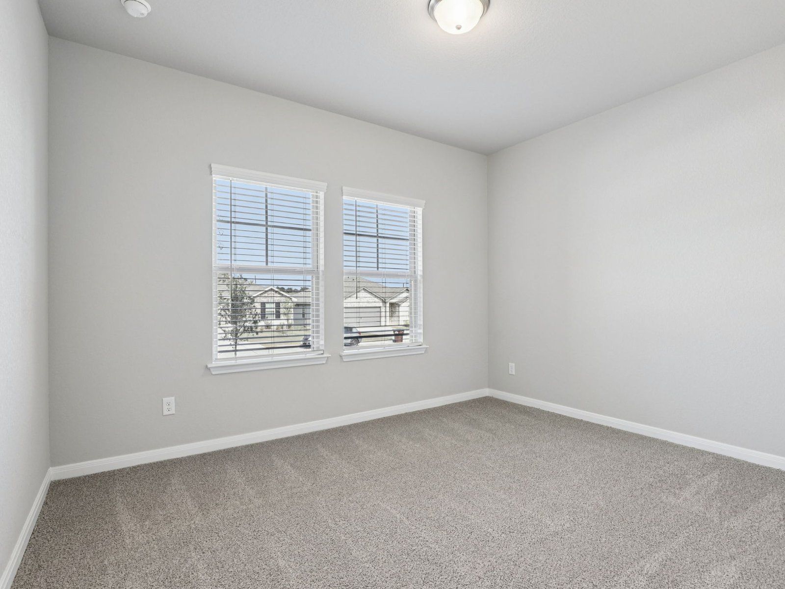 Secondary Bedroom:Secondary bedroom in the Kessler floorplan at a Meritage Homes community.