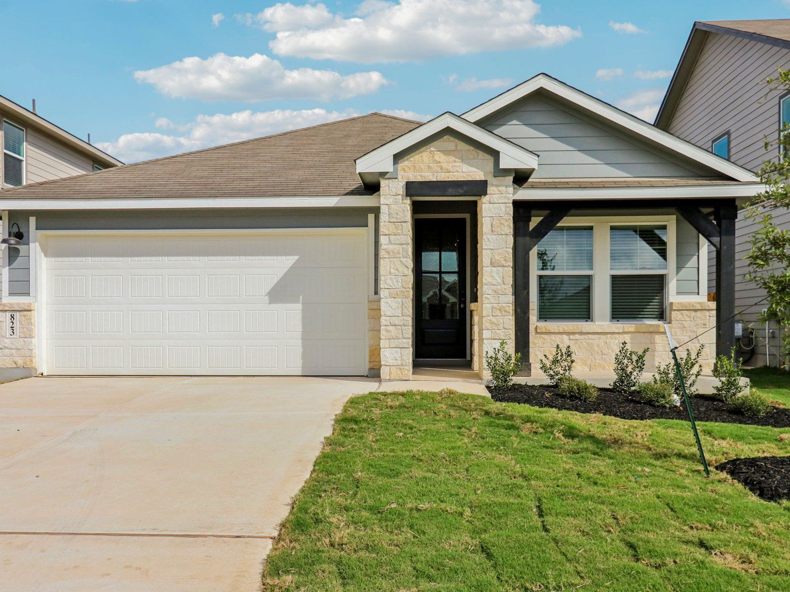 Front exterior of the Allen floorplan at a Meritage Homes community.:Front Exterior