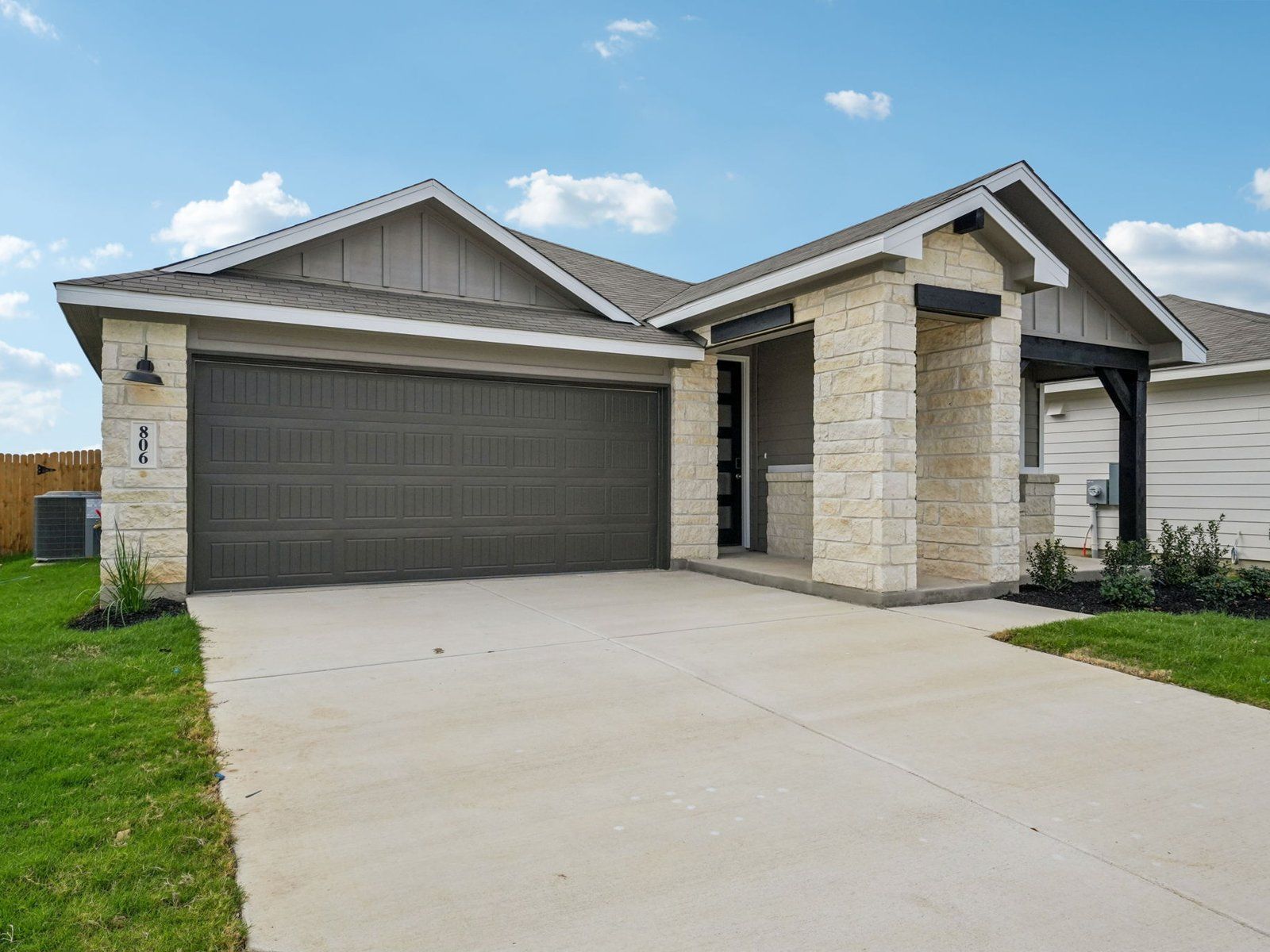 Front exterior of the Briscoe floorplan at a Meritage Homes community.:Front Exterior