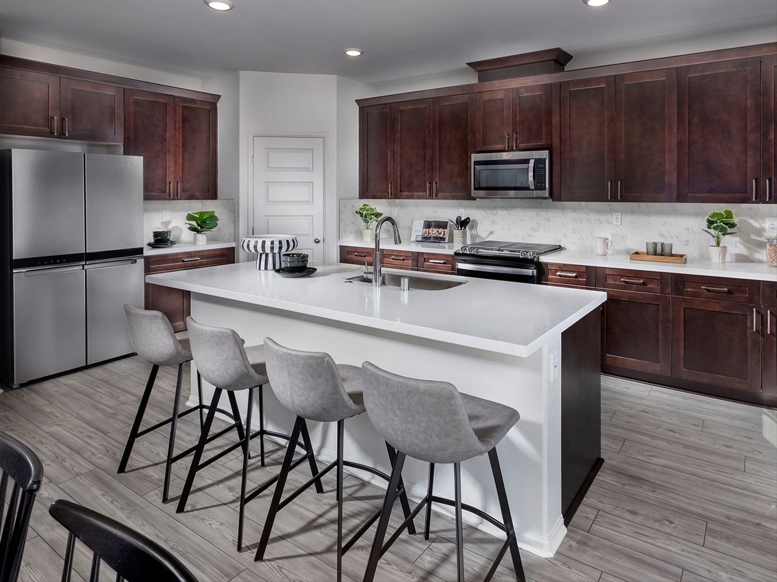 Kitchen:Residence 3 floorplan interior image taken at a nearby Meritage community.