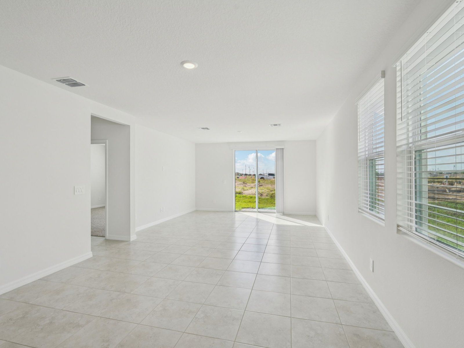 The Acadia floorplan at 5526 Clove Row.:Great Room