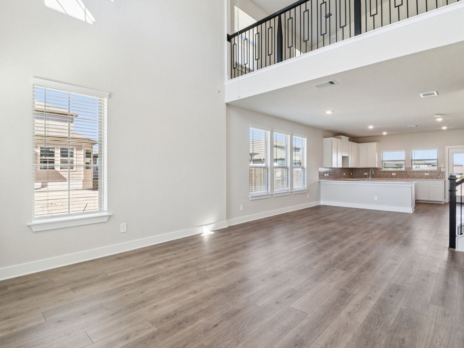 Living Dining and Kitchen in a Medina floorplan at a Meritage Homes community.:Living Dining and Kitchen