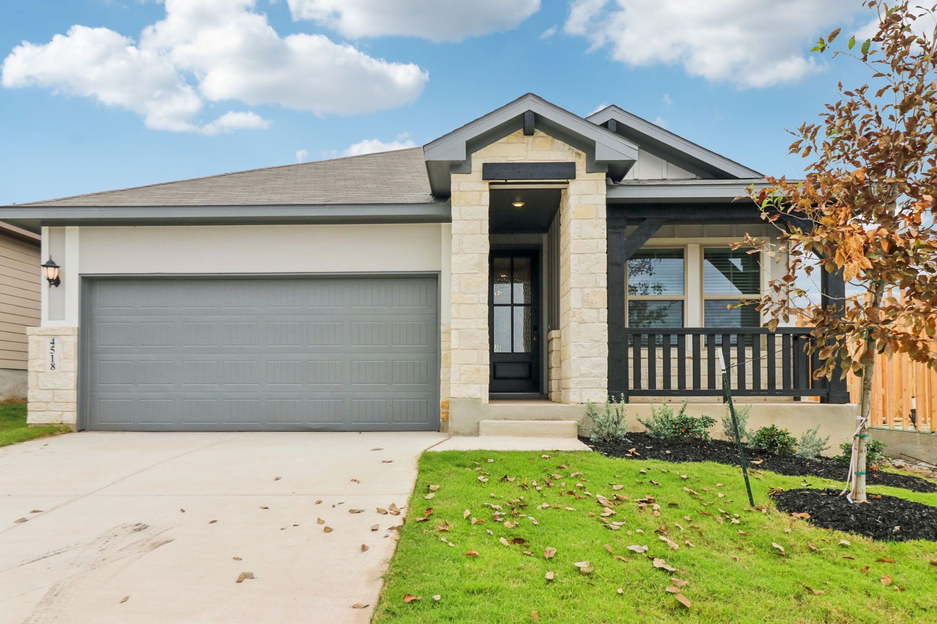 Front exterior of the Callaghan floorplan at a Meritage Homes community.:Front Exterior
