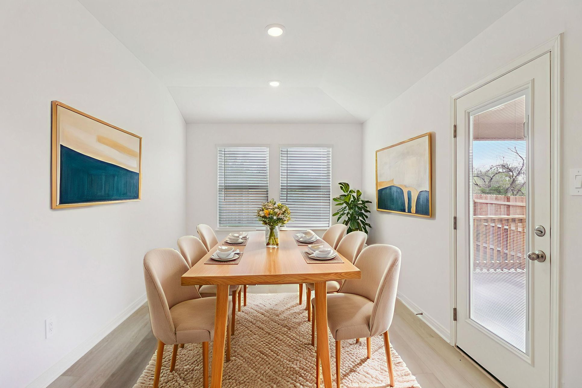 Virtually staged dining room in the Callaghan floorplan at a Meritage Homes community.:Virtually Staged Dining Room