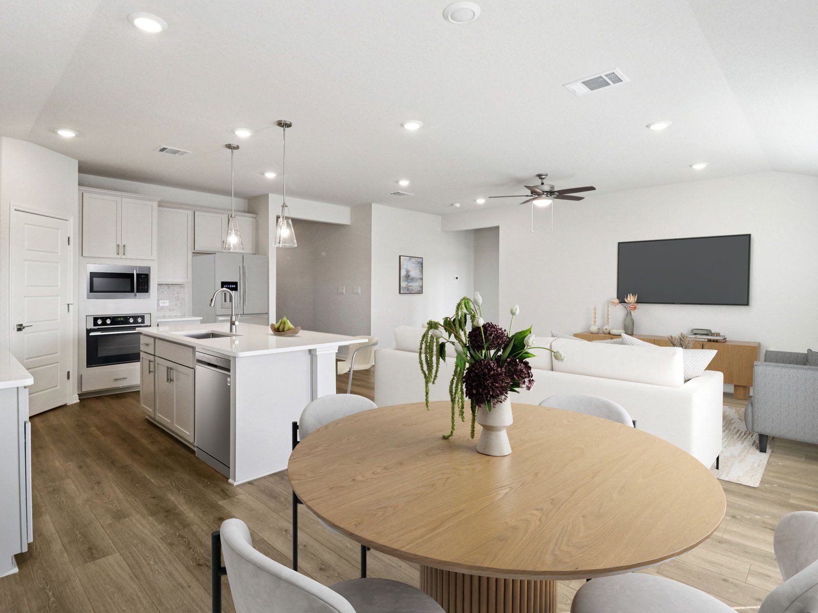 Virtually Staged Dining Room:Virtually staged dining room in the Henderson floorplan at a Meritage Homes community.