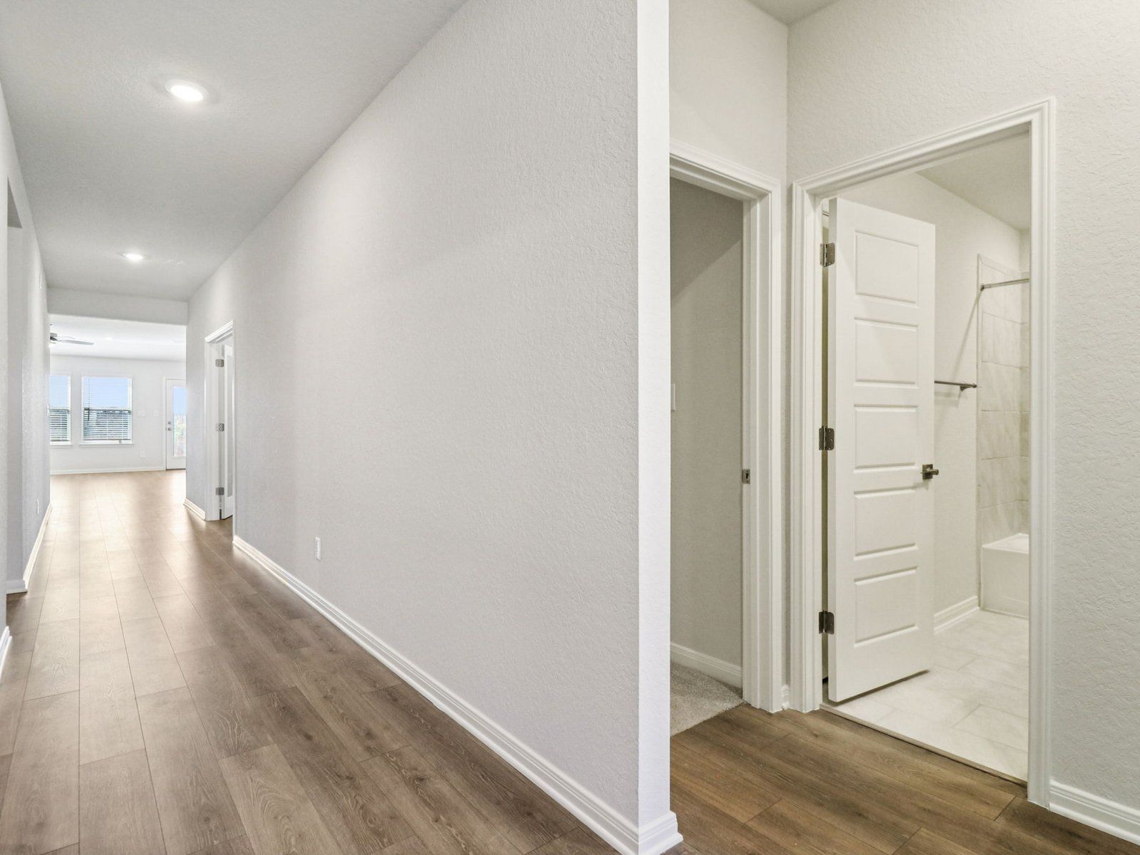 Hallway in the Henderson floorplan at a Meritage Homes community.:Hallway
