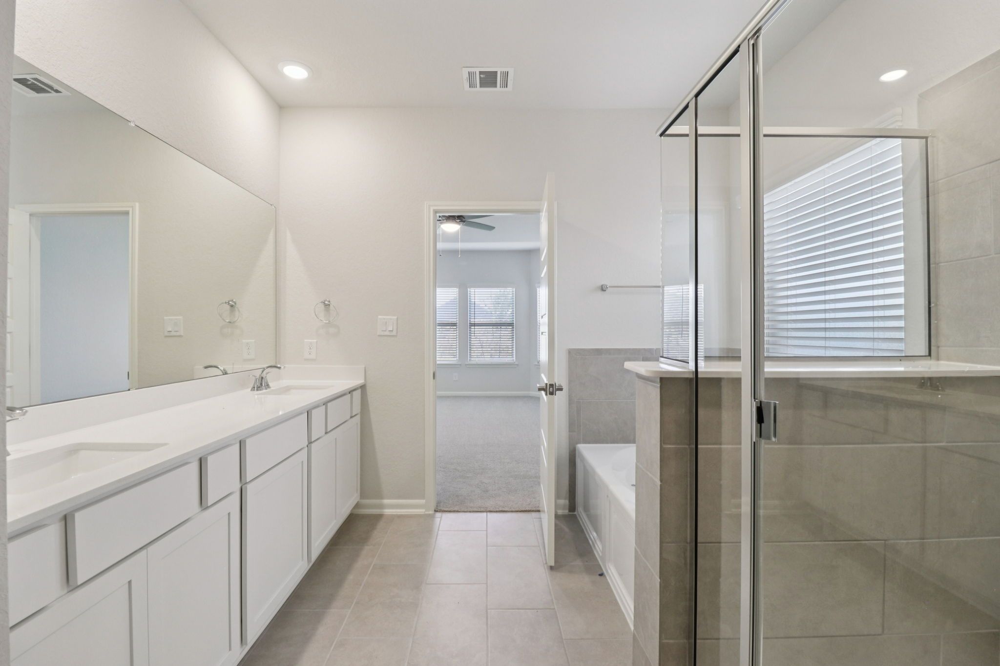 Primary Bathroom:Primary bathroom in the Kessler floorplan at a Meritage Homes community.