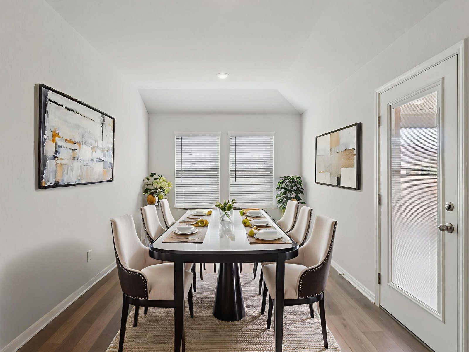 Virtually staged dining in the Callaghan floorplan at a Meritage Homes community.:Virtually Staged Dining Room