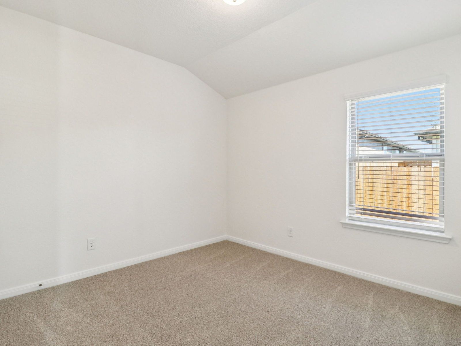 Guest bedroom in the Fitzhugh floorplan at a Meritage Homes community.:Guest Bedroom