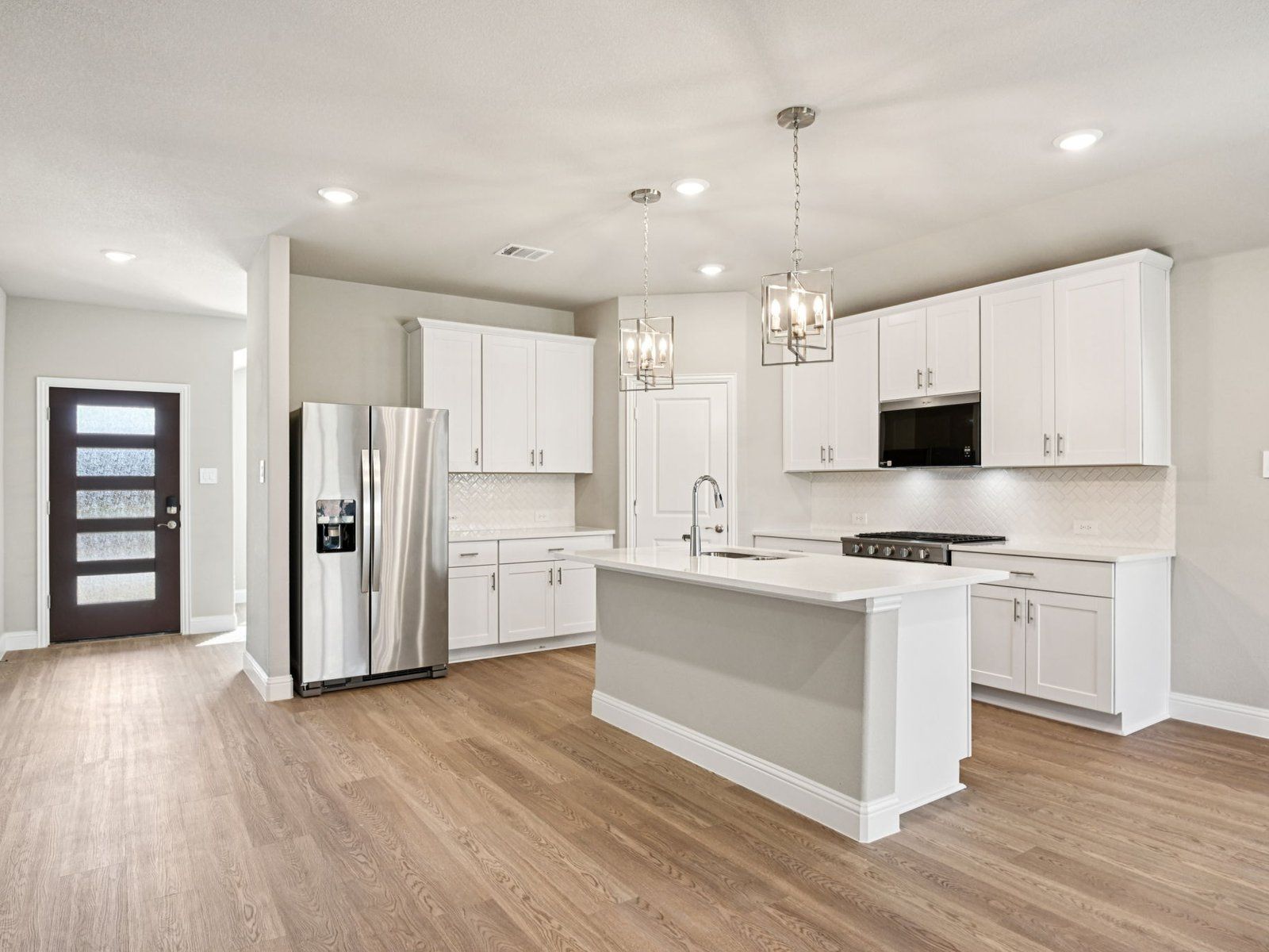 The Oleander floorplan with the Divine interior package.:Kitchen