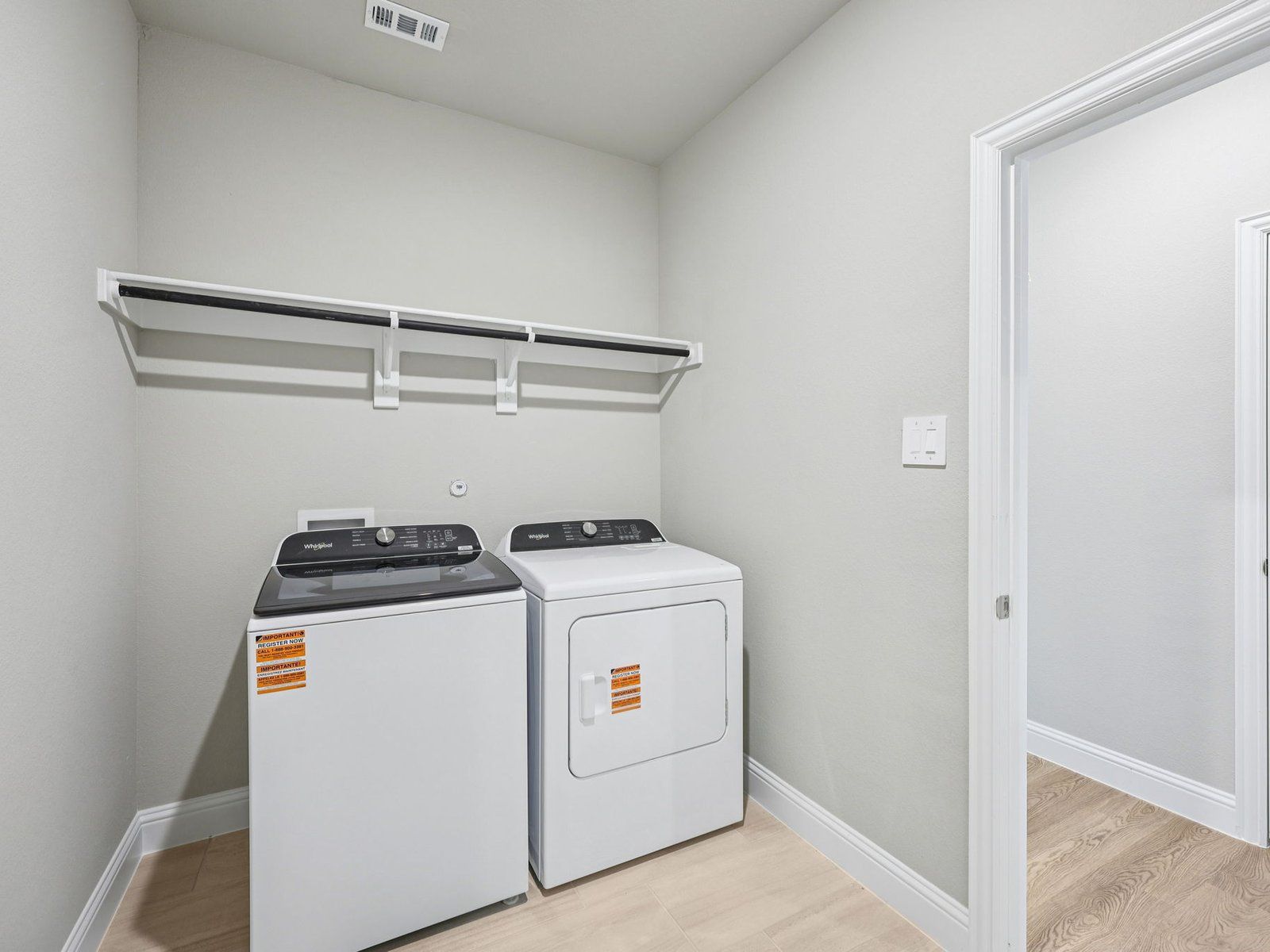 The Henderson floorplan with the Divine interior package.:Laundry Room