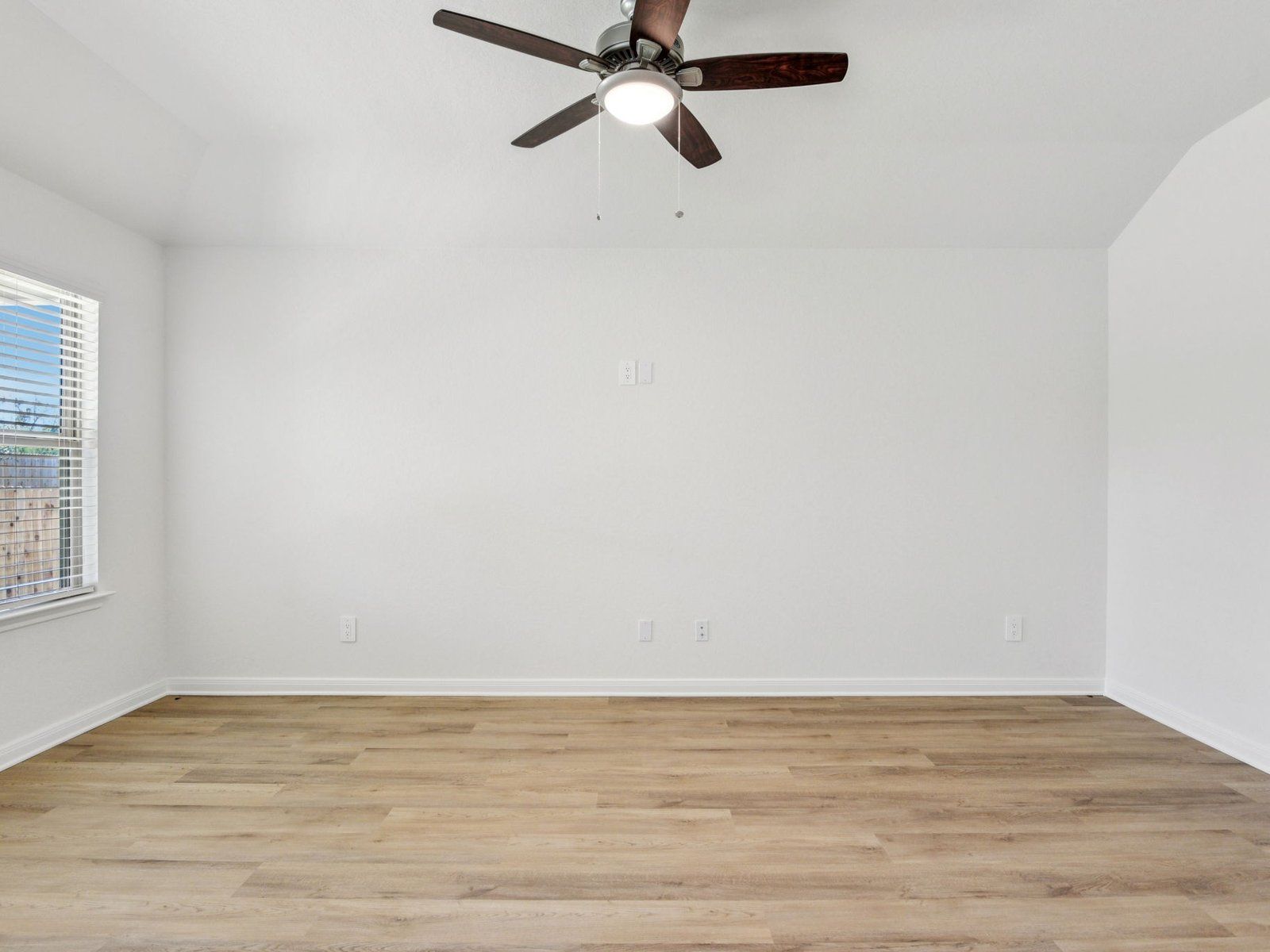 Guest Bedroom:Guest bedroom in the Callaghan floorplan at a Meritage Homes community.
