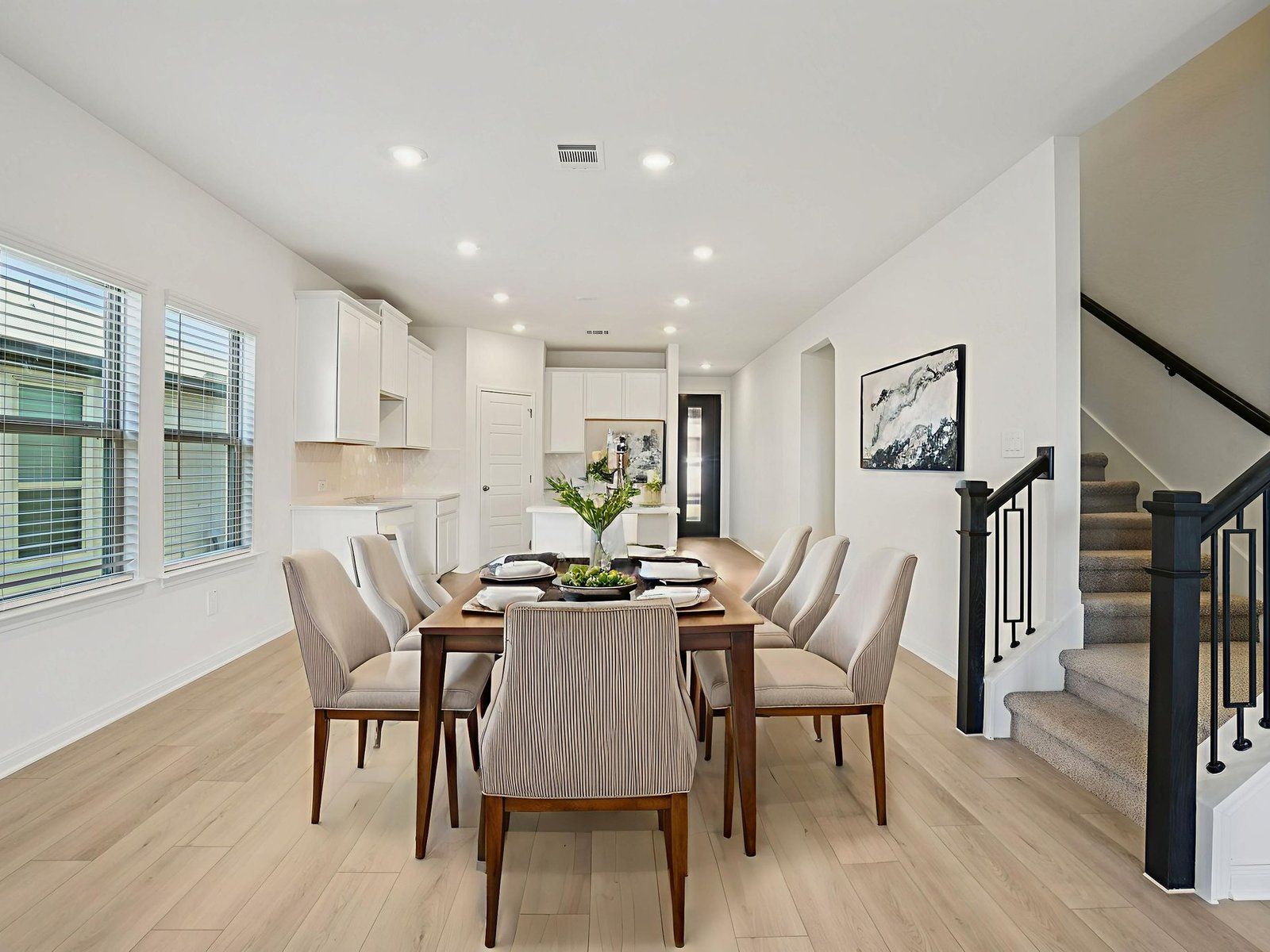 Virtually staged dining room in the Matador floorplan at a Meritage Homes community.:Virtually Staged Dining Room