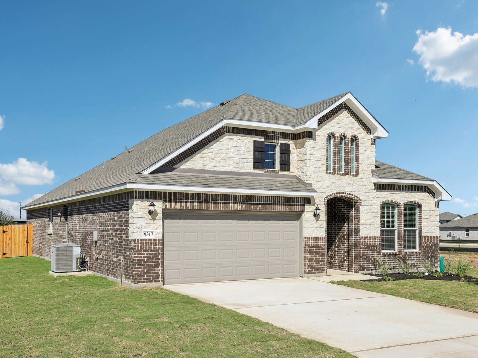 Front Exterior:Front exterior of the Holly floorplan at a Meritage Homes community.